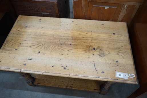 An 18th century style pale oak two tier coffee table, length 91cm, depth 50cm, height 45cm